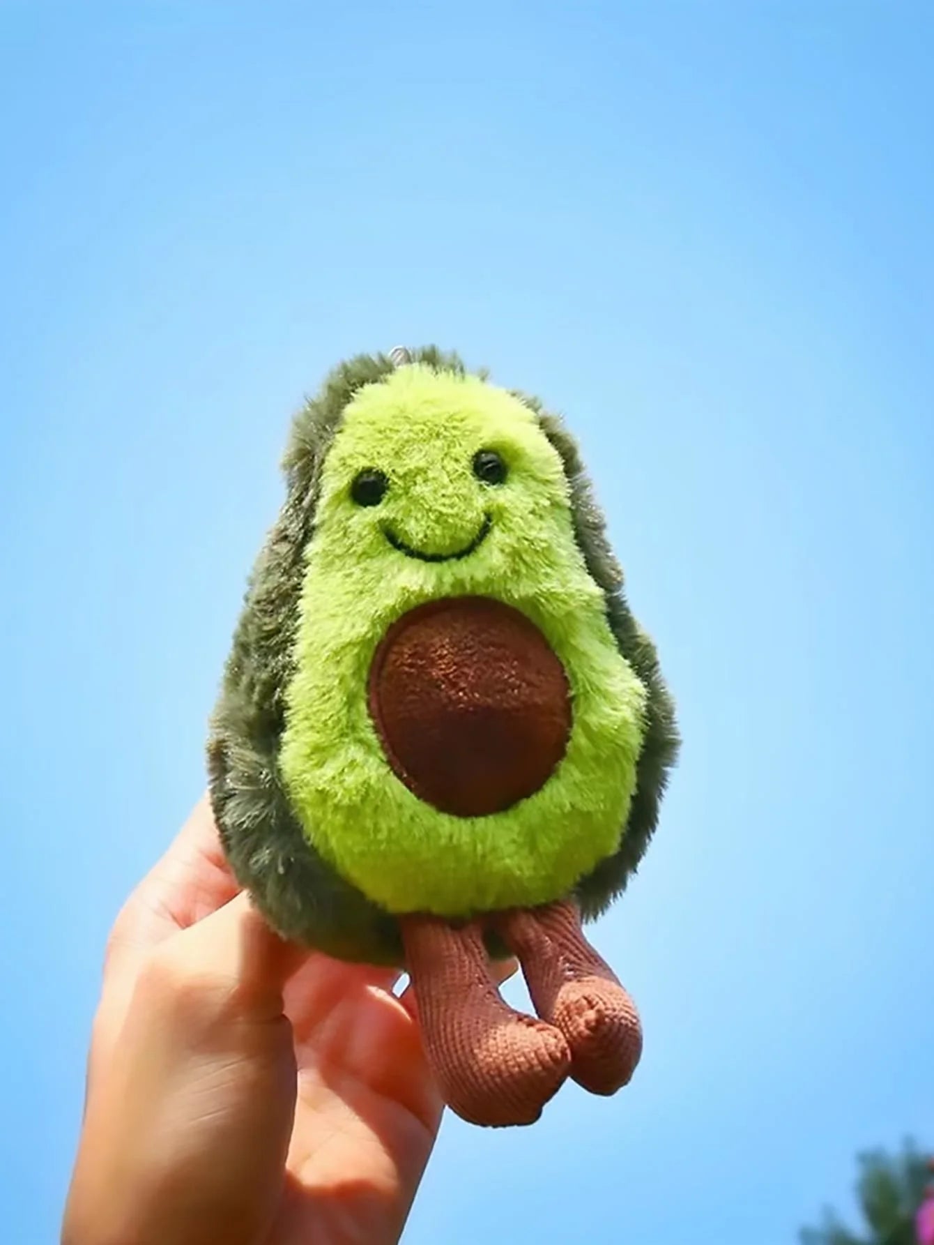 Et sødt avocado-kæledyrsbamse, velegnet til dagligt selskab med små og mellemstore hunde.