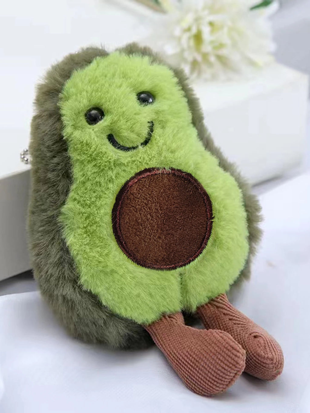 Sødt avocado-kæledyrslegetøj.
