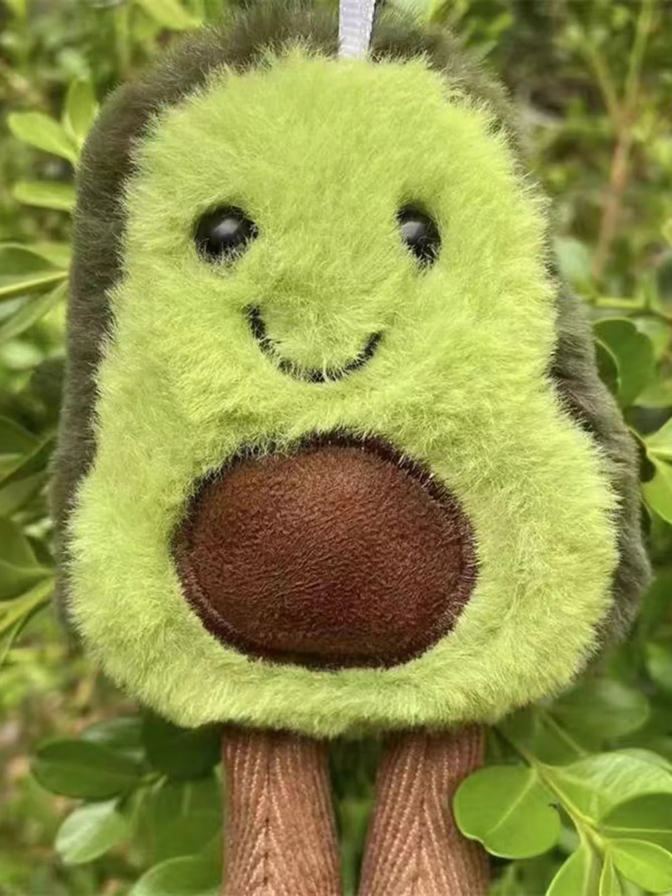 Et sødt avocado-kæledyrsbamse, velegnet til dagligt selskab med små og mellemstore hunde.